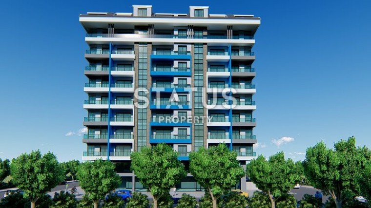 Апартаменты 1+1 и 2+1 в комплексе на стадии котлована в Махмутларе. фото 1